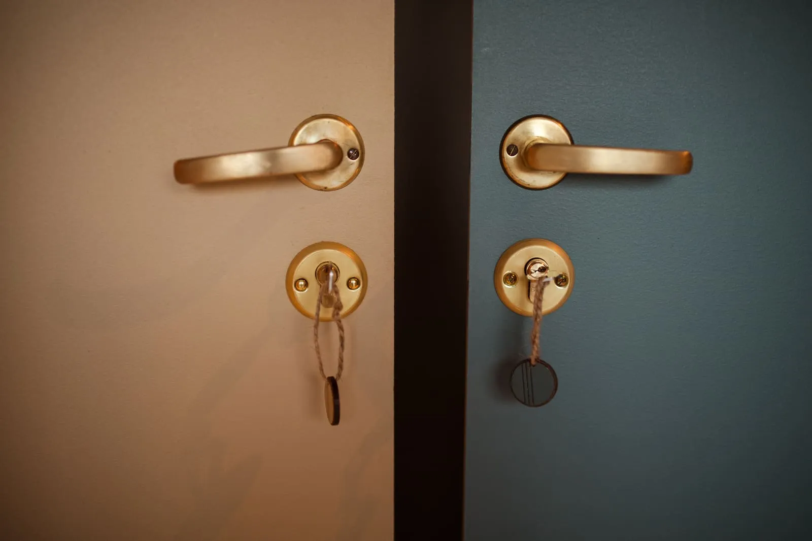 Brass handles on the changing room and bathroom doors